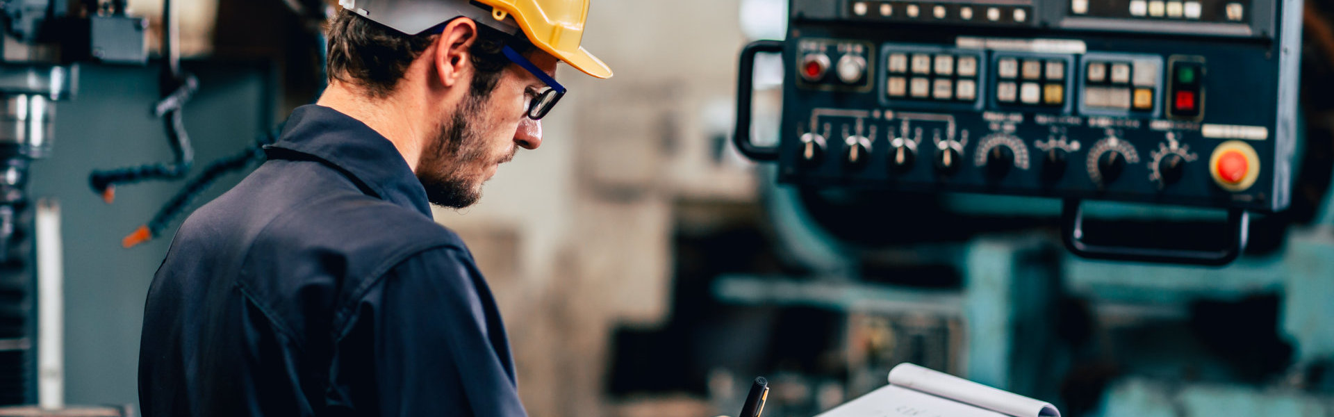 young profession technician engineer operate heavy machine